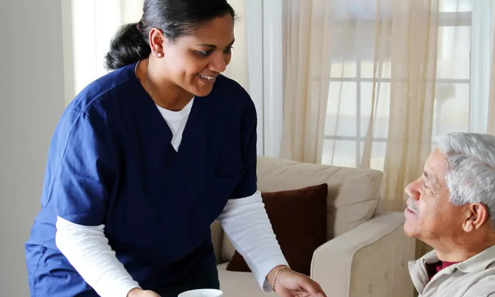 A caregiver supporting an older adult